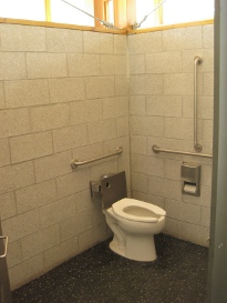 Low-flow toilet fed with harvested rain water in the Vincent
      Massey Park service pavilion.