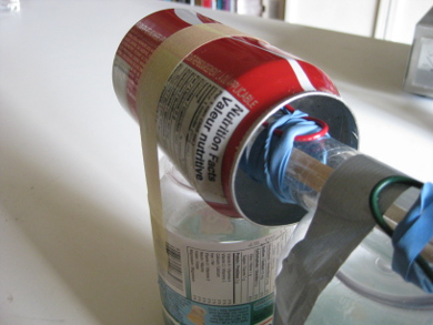 Coke soda can used as the dome for a Van de Graaff generator.