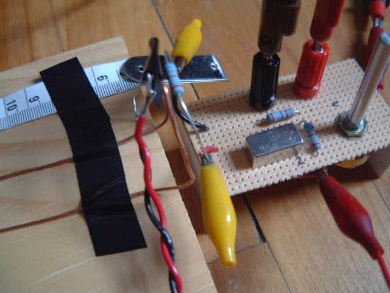 Close-up of the UHF oscillator loop near the lecher line loop with
      the diode loop in place for measuring voltage.