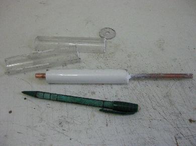 The resulting hardened barium titanate and epoxy cylinder.