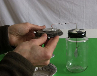 Testing the bottom of the electret with the homemade/DIY electroscope.