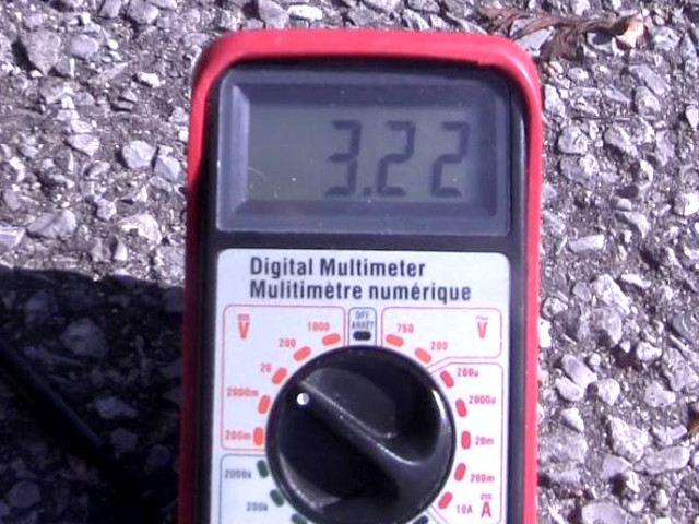 Measuring the solar panel's open circuit voltage.