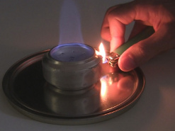 Heating the side of the alcohol stove directly.