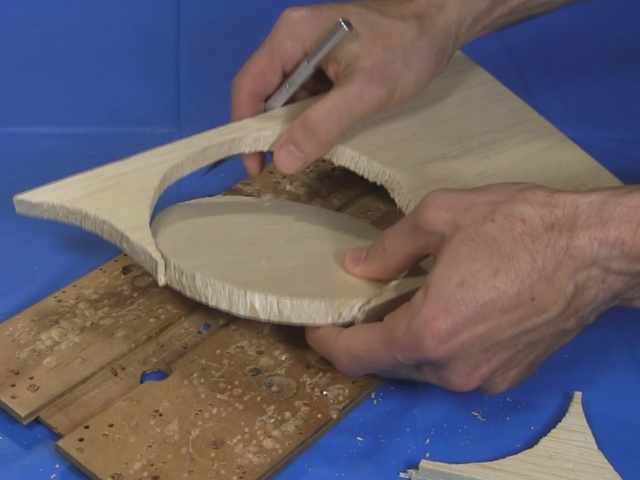 Cutting the balsa wood base for BB-8's head support.