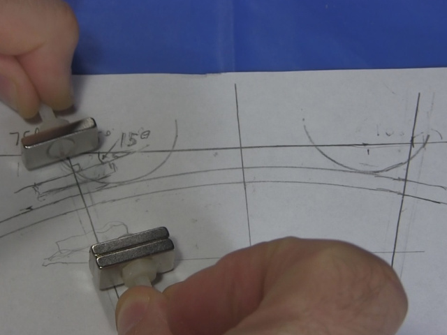 Cutaway, side view of a drawing of the head support and BB-8's ball, with magnet locations drawn in.