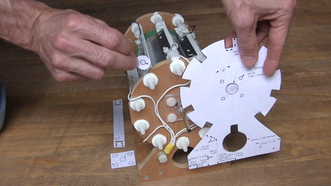 All the templates cut out and positioned around the corona motor.