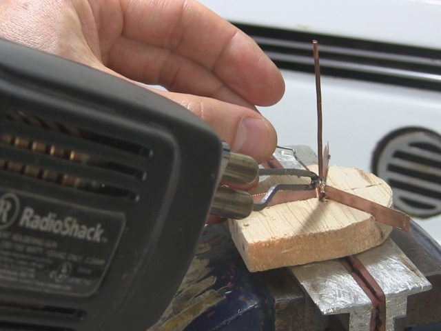 Soldering the parts together for the curie temperature motor.