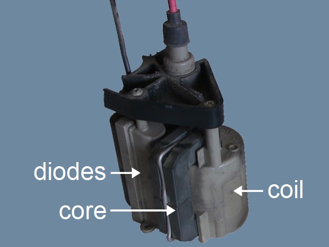 The flyback transformer with built in diodes.