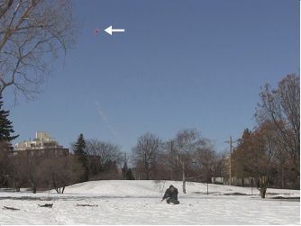 Bottle rocket at its highest point in flight.