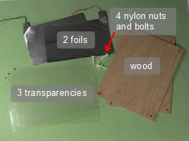 All of the parts for the flat place Tesla coil capacitor.