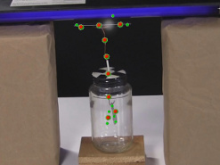 An electron leaving the metal plate.