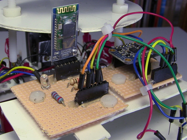 DIY boards with female pin headers and jumper wires connecting things together.