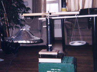 T.T. Brown Bahnson labs test diagram with saucer suspended
      using a balance.